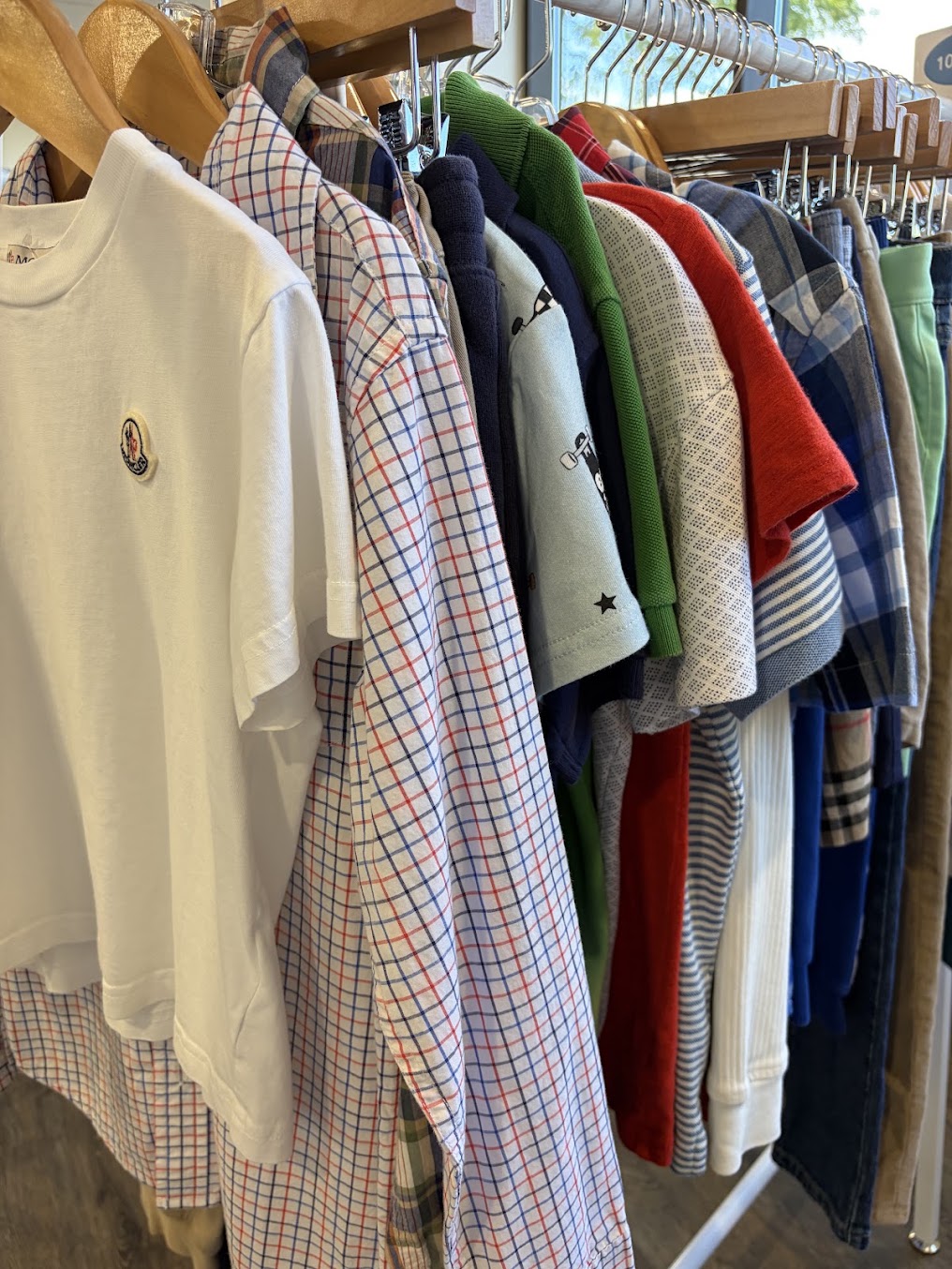 A selection of children’s shirts at The Young Wardrobe